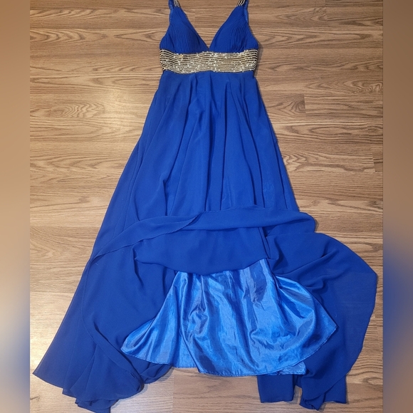 Elegant Blue Evening Gown with Gold Beading by Scala - Picture 14 of 16